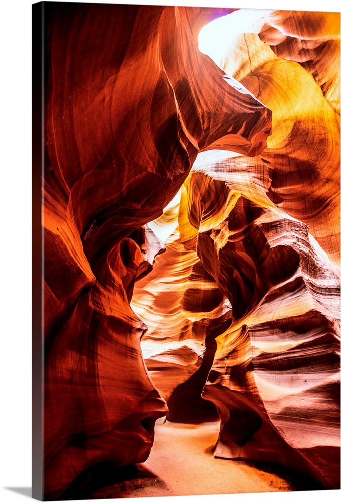Photo from inside of Antelope Canyon rock formation located on the Navajo Reservation in Page, Arizona with flowing shapes...