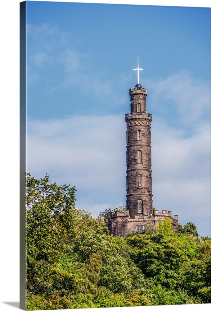 The Nelson Monument sits atop Calton Hill and is a commemorative tower in honor of Vice Admiral Horatio Nelson, located in...