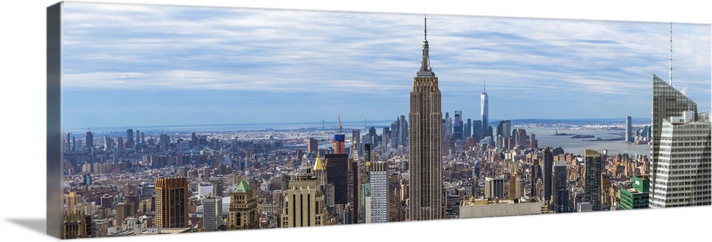 Panoramic view of New York City with the Empire State Building in the center.