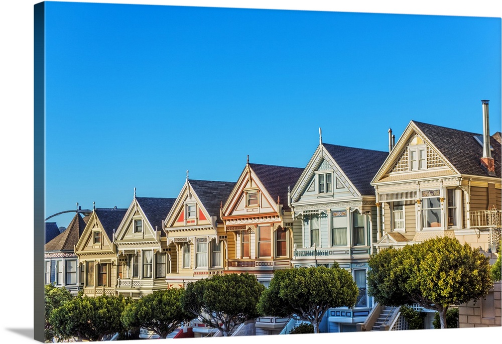Photograph of the Painted Ladies in downtown San Francisco with a bright blue sky above.