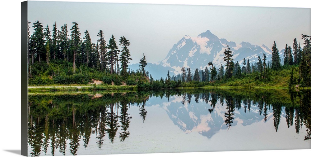 Mount Shuksan is reflected in Picture Lake near Mount Baker, Washington.