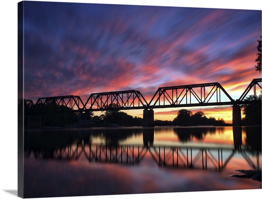 Photograph of a bridge silhouette at sunset in Providence Metropark.