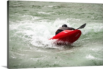 Red Kayaker paddling through Whitewater Rapids - I