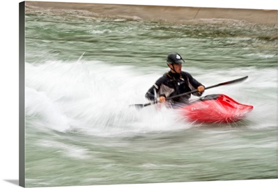 Red Kayaker paddling through Whitewater Rapids - III