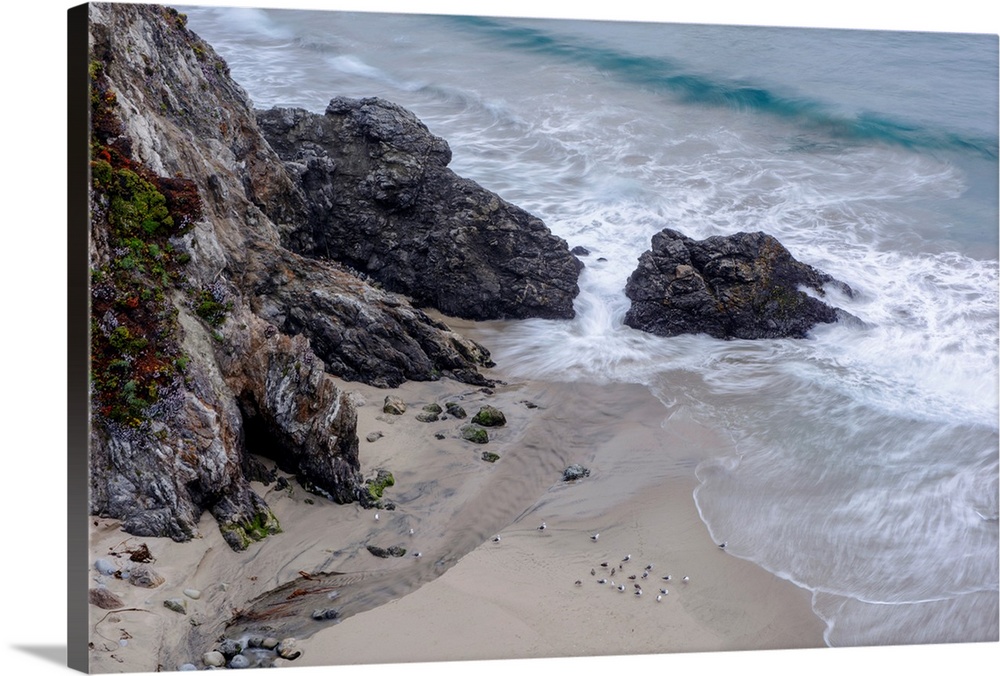 View of Rocky Creek Bridge beach rocks in Monterey County, California.
