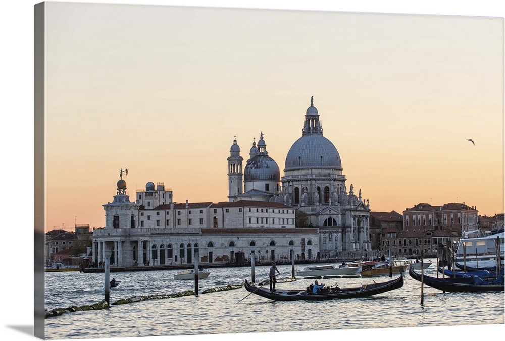 Photograph of the Santa Maria della Salute (The Salute) from the water at sunset.