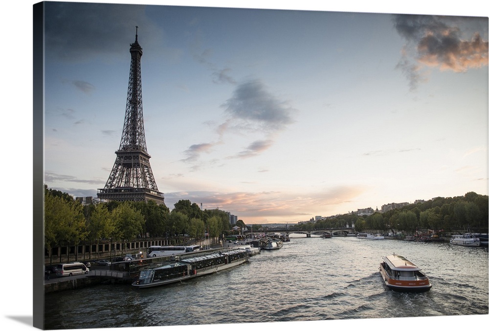 Landscape photograph of the Seine River with the Eiffel Tower on the side.