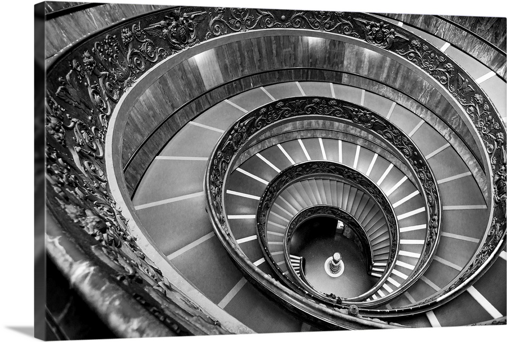 Black and white photograph of the spiral staircase at the Vatican Historical Museum.