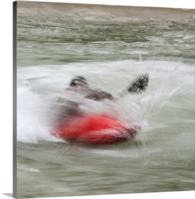 Square View Of Red Kayaker paddling through Whitewater Rapids - II