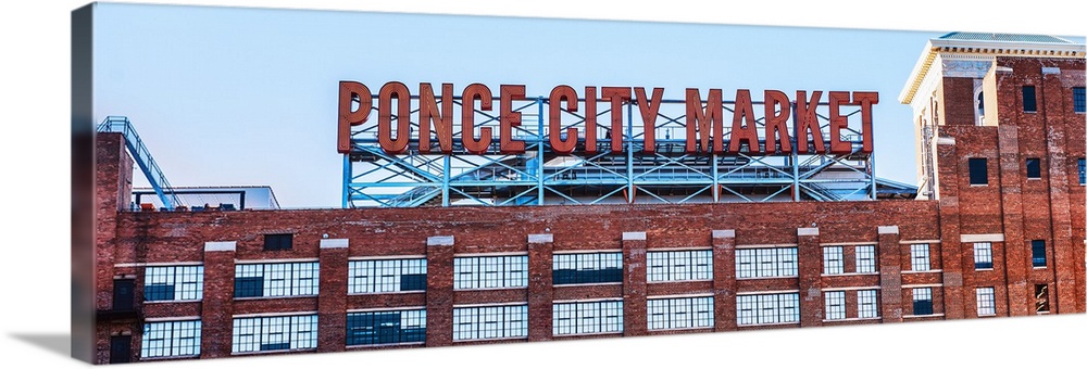 Tall neon letters on the rooftop terrace of Ponce City Market, a historic Sears, Roebuck and Co. building in downtown Atla...