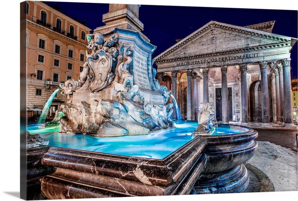 Photograph of the Pantheon Fountain lit up at night in Piazza della Rotond, Rome.