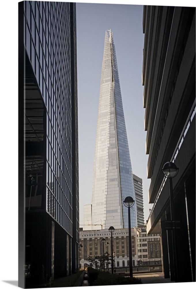 Photograph of The Shard building in Southwark, London, seen through two other buildings.