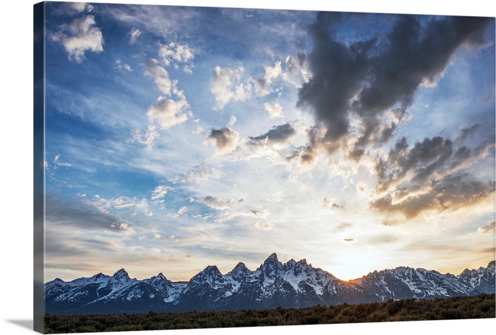View of clouds over Teton mountains in the morning in Wyoming.