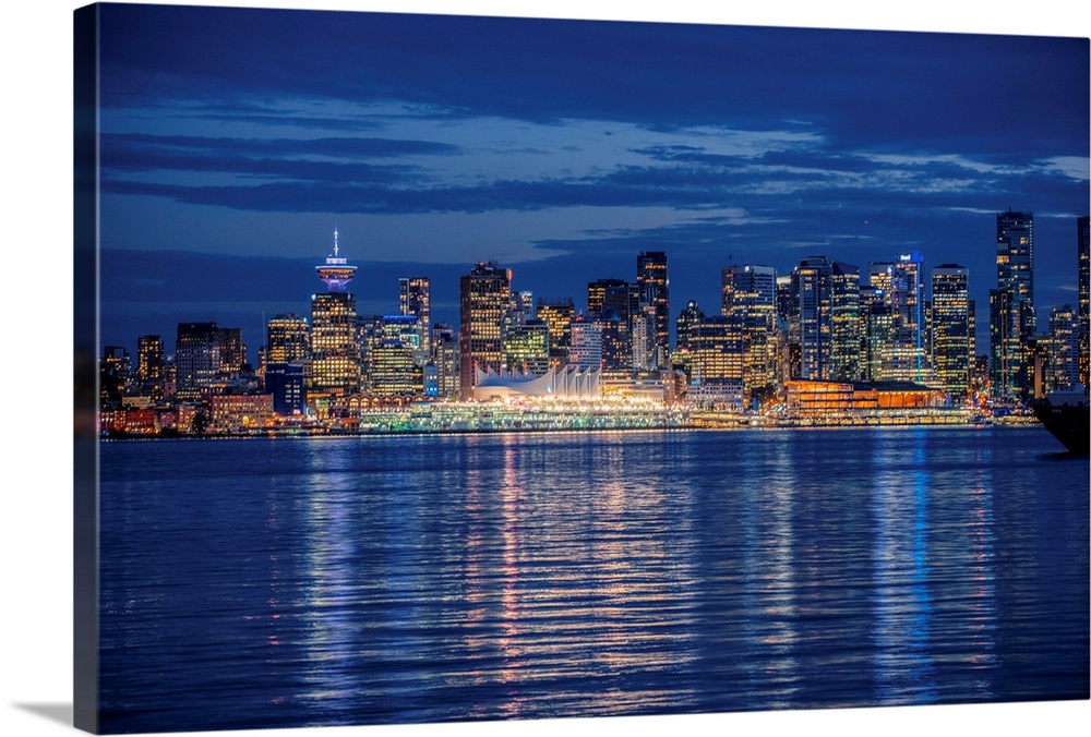 View of Vancouver skyline at night in British Columbia, Canada.