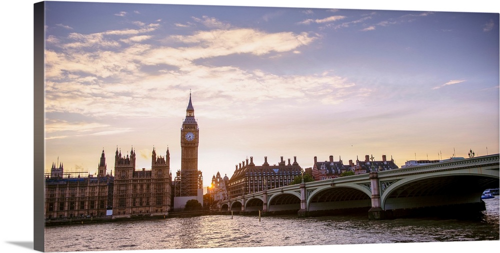 Panoramic photograph of the Westminster Bridge over the River Thames with Big Ben in the background at sunset, Westminster...