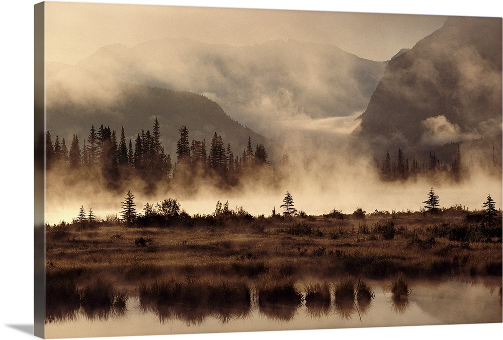 Big landscape photograph from the National Geographic Collection of foggy Banff National Park in Alberta, Canada.  Mountai...
