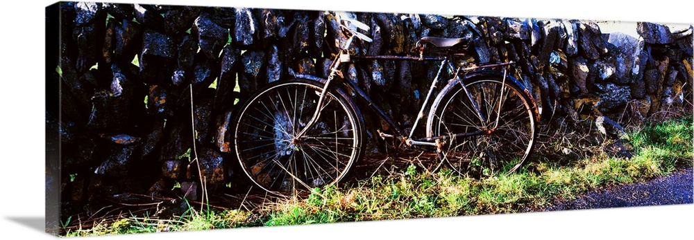 The Burren, County Clare, Ireland, Bicycle Leaning Against Stone Wall