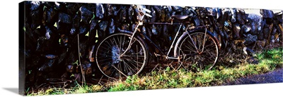 The Burren, County Clare, Ireland, Bicycle Leaning Against Stone Wall