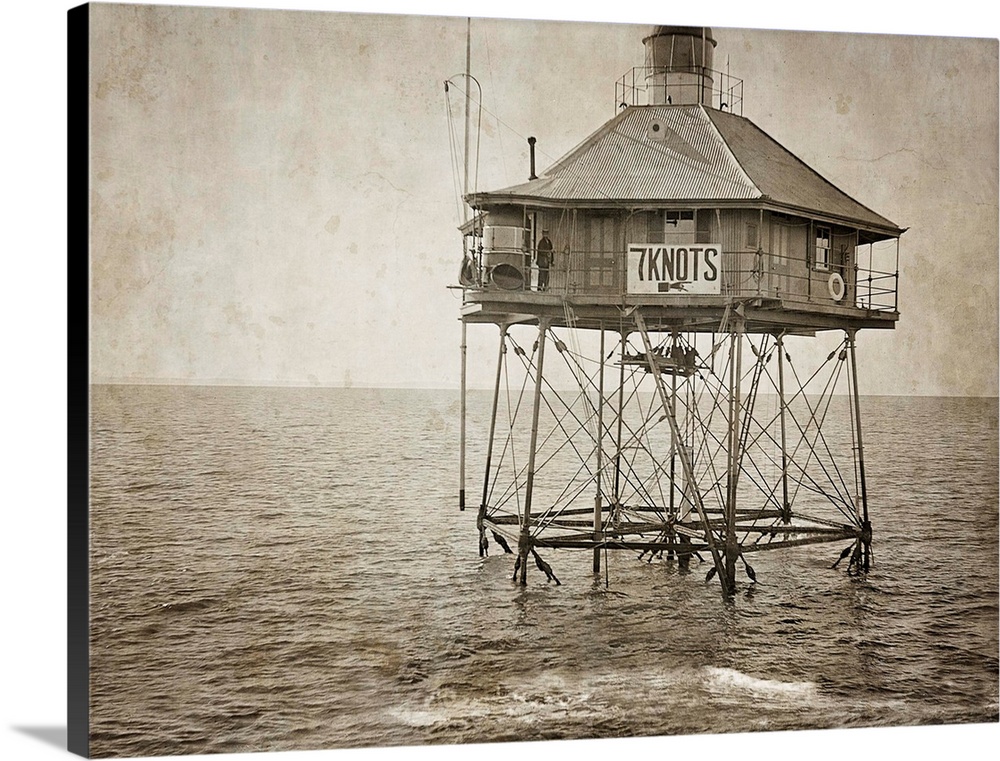 An antique photograph of a Lighthouse on stils instructing vessels that the Safe speed is 7 knots.