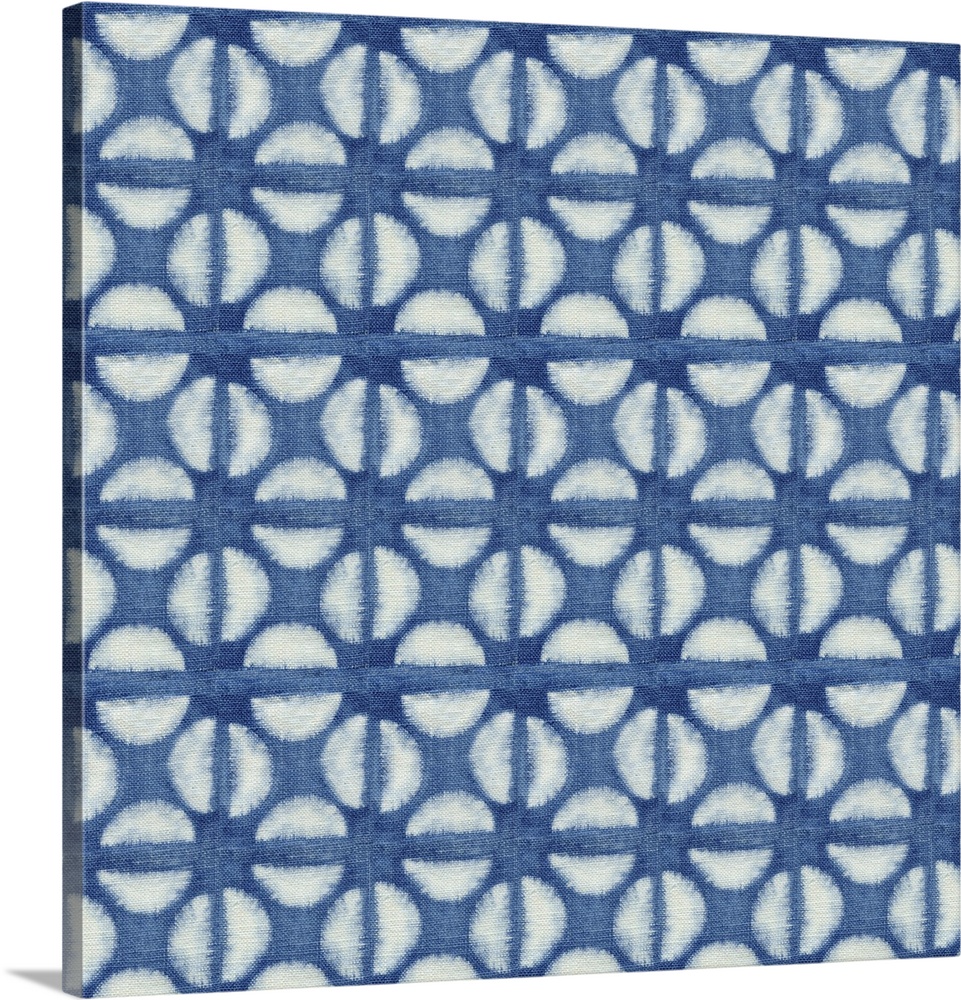 Decorative design of rows of white circles with lines going through them on blue linen.