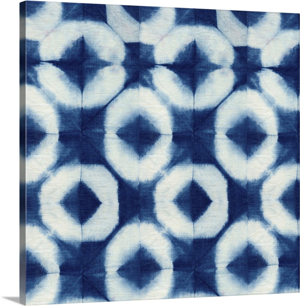 Decorative design of rows of white rings on blue linen.
