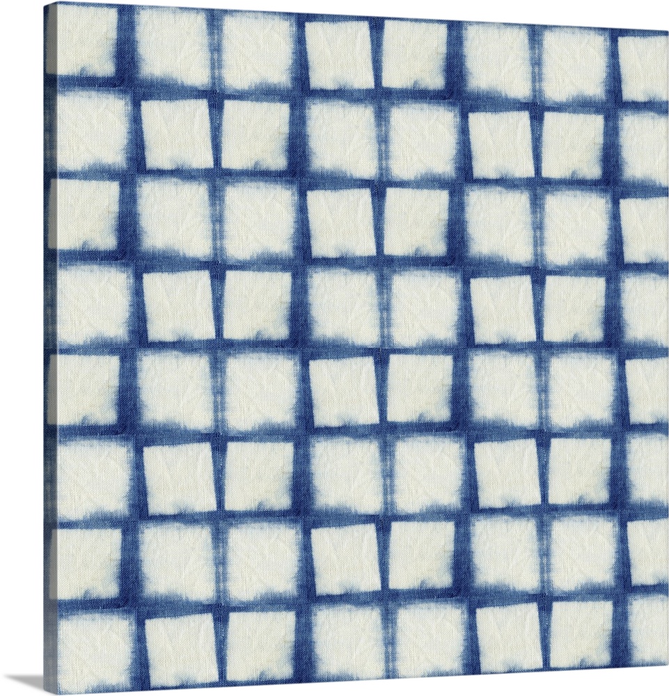 Decorative design of rows of white squares on blue linen.