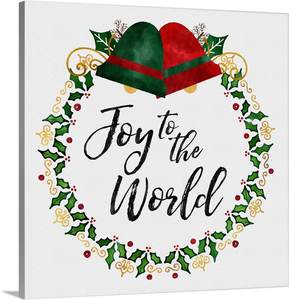 "Joy To The World" surrounded by a holiday wreath and bells on a white linen backdrop.