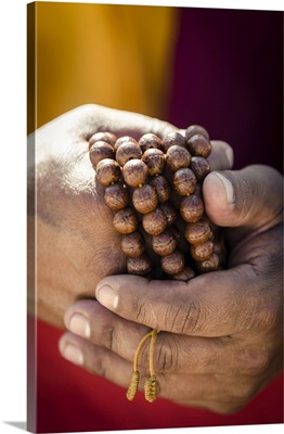 A Buddhist Monk Holds Prayer Beads (Japa Mala), Bodhnath, Nepal