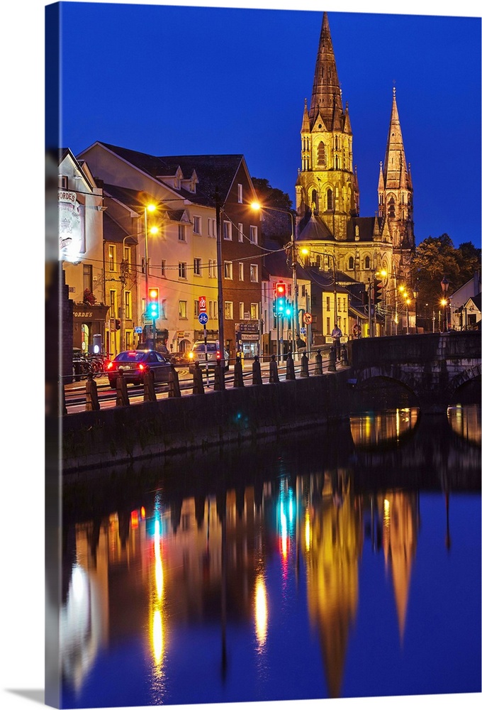 A dusk view of St. Fin Barre's Cathedral, on the banks of the Lee River, in Cork, County Cork, Munster, Republic of Ireland