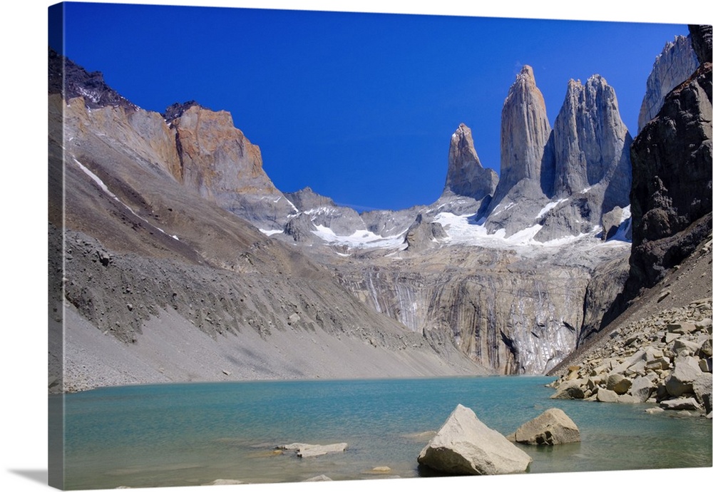 A glacial lake and the rock towers that give the Torres del Paine range its name, Torres del Paine National Park, Patagoni...