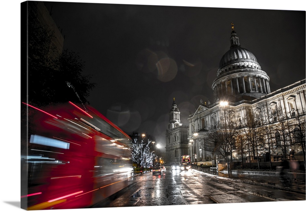A London bus drives past St. Paul's Cathedral towards Christmas lights, London, England, United Kingdom, Europe
