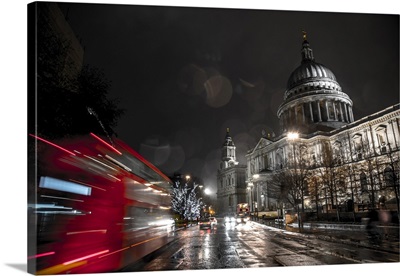 A London Bus Drives Past St. Paul's Cathedral Towards Christmas Lights, London, England