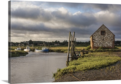 A view of boats moored in the creek at Thornham, Norfolk, England