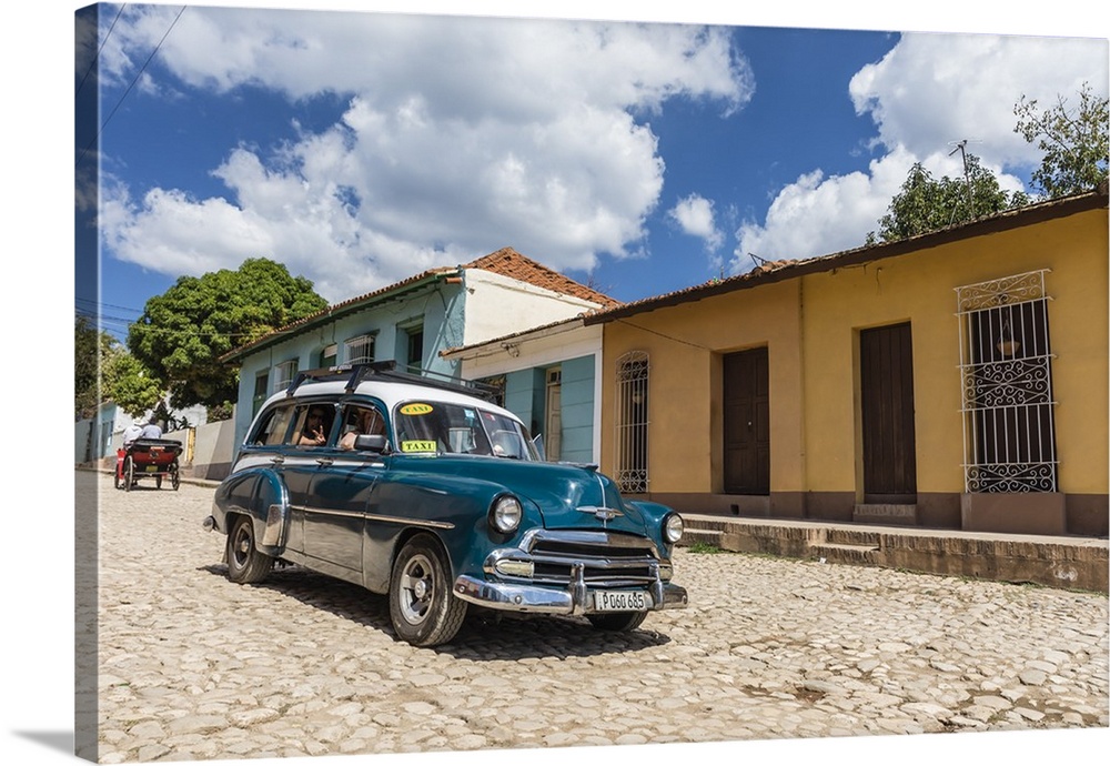 A vintage 1950's American car working as a taxi in the town of Trinidad, Cuba, West Indies, Caribbean