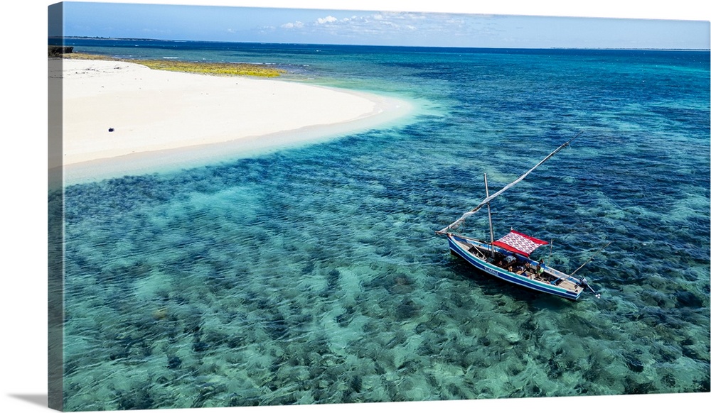 Aerial of a traditional Dhow on a white sand beach, Goa island near the Island of Mozambique, Mozambique, Africa