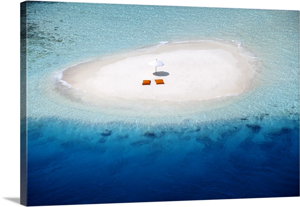 Aerial view of a sandbank, pillows and sun umbrella, Maldives, Indian Ocean