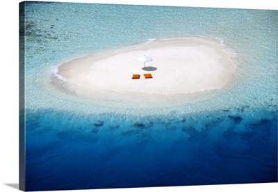Aerial view of a sandbank, pillows and sun umbrella, Maldives, Indian Ocean