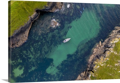 Aerial View Of A Yacht Moored In Port Quin, Cornwall, England, UK
