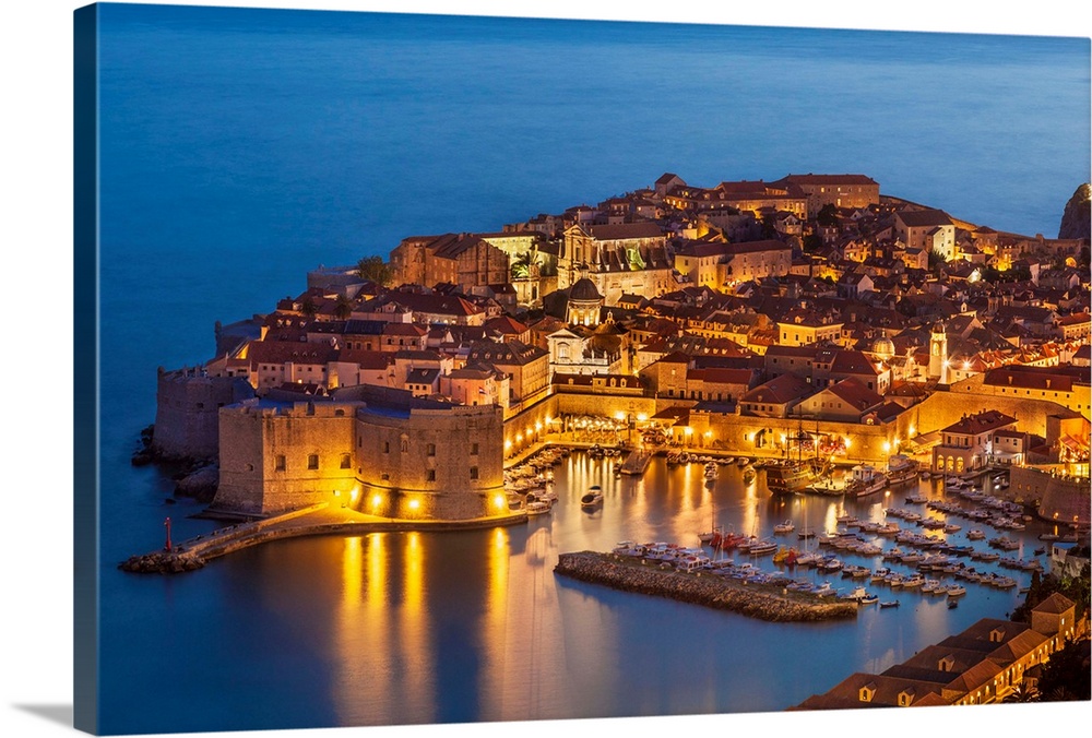 Aerial view of Old Port and Dubrovnik Old Town at night, Dubrovnik, Dalmatian Coast, Croatia