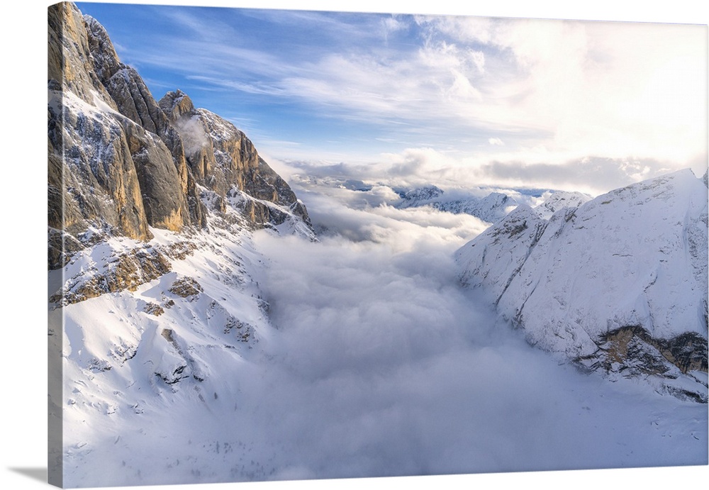 Aerial view of Valle Ombretta covered by clouds from Marmolada, Dolomites, Veneto, Italy, Europe