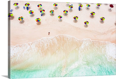 Aerial View Of Woman Sunbathing On A Tropical Beach, Antigua, Caribbean
