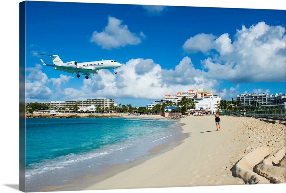 Airplane flying in the Princess Juliana International Airport of Maho Bay, Sint Maarten, West Indies, Caribbean