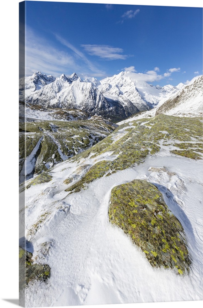 Sunshine and snow at Alpe Fora with Monte Disgrazia in the background, Malenco Valley, Province of Sondrio, Valtellina, Lo...