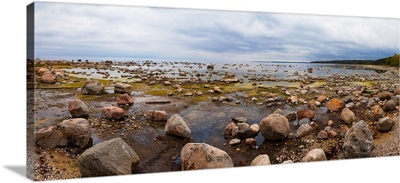 Baltic Sea coast with granite boulders on a cloudy day, Estonia