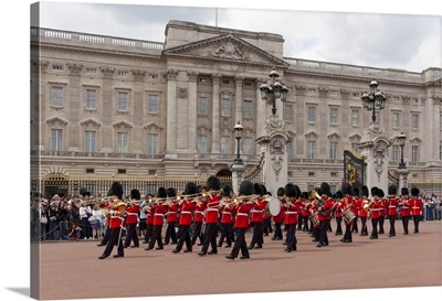 Band of the Scots Guards lead the procession from Buckingham Palace, London