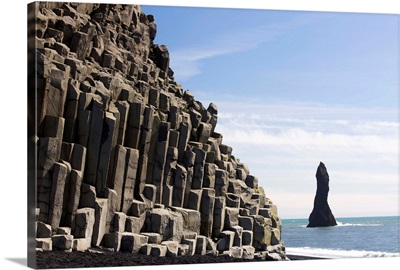 Basalt cliffs and rock stack, Halsenifs Hellir Beach, South Iceland, Iceland