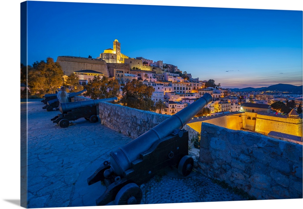 View of Bastion, cannons, ramparts, Cathedral and Dalt Vila old town at dusk, UNESCO World Heritage Site, Ibiza Town, Bale...