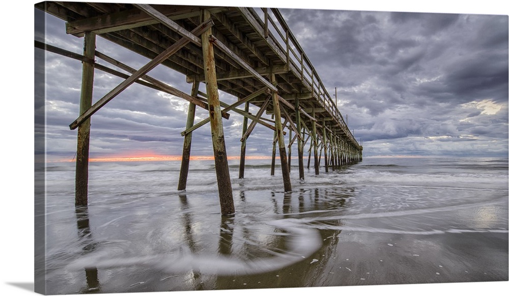 Beach, ocean, waves and pier at sunrise, Sunset Beach, North Carolina, United States of America, North America