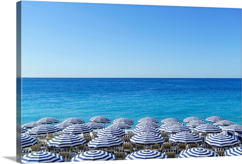 Blue and white beach parasols, Nice, Cote d'Azur, Alpes-Maritimes, Provence, French Riviera, France, Mediterranean, Europe