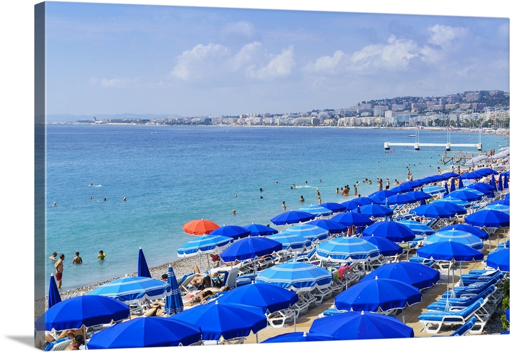 Blue parasols on the beach, Promenade des Anglais, Nice, Alpes Maritimes, Cote d'Azur, Provence, France